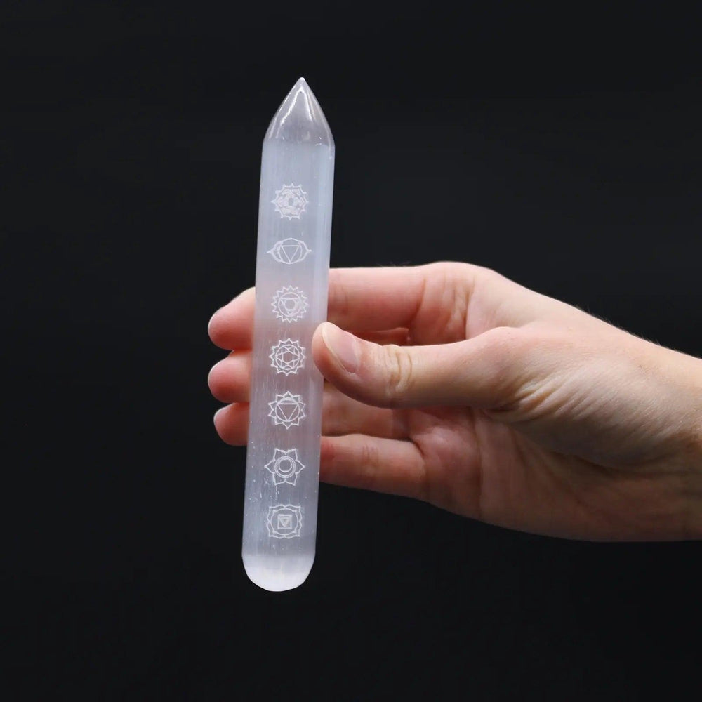 Buy Engraved Selenite Wand Reiki, Feng Shui, Crystal Healing & Meditation - Wand: used to cleanse the aura, move stagnant energy, and encourage flow Keep a selenite wand by the front door to cleanse energy as you walk in. Use selenite to amplify the energy of other crystals. Selenite towers amplify energy, so if you put a selenite tower near other crystals, expect a huge increase. Enhance meditation practice. at Sacred Remedy Online