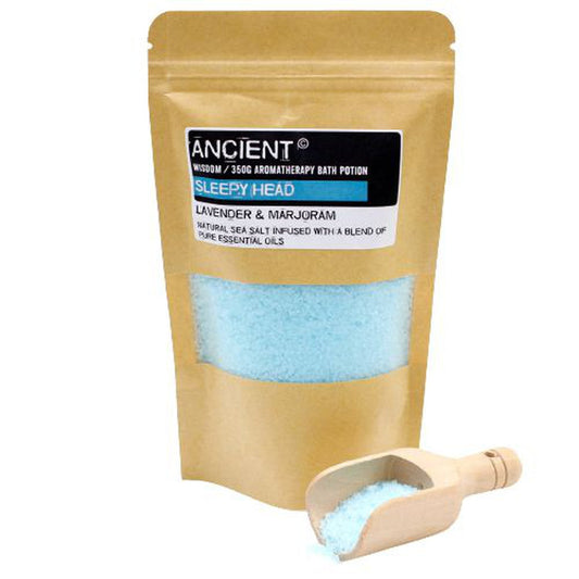 Buy - 350g Sleepy Head bath salt blend. Lavender & Marjoram natural sea salt infused with a blend of pure essential oils. One aromatic benefit that Lavender essential oil is widely known for is its ability to promote a relaxing atmosphere that leads to a restful night’s sleep. The calming properties of the oil help create a serene environment that is optimal for resting well and staying asleep. If you're looking for a way to relieve stress, ease achy muscles, and treat irritated skin, you may want to consid